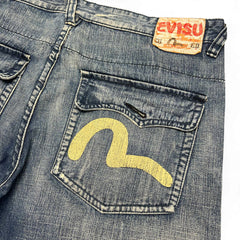 TWC Vintage Evisu Baggy Jeans in verwaschenem Blau mit gelbem Seagull-Logo auf der Gesäßtasche und Lederpatch