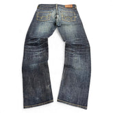 TWC Vintage Edwin Jeans aus japanischem Selvedge-Denim in verwaschenem Dunkelblau mit Leder-Patch auf der Rückseite