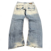 TWC Vintage Diesel Bootcut Jeans in verwaschenem Blau mit Reißverschlusstaschen und ausgefransten Säumen