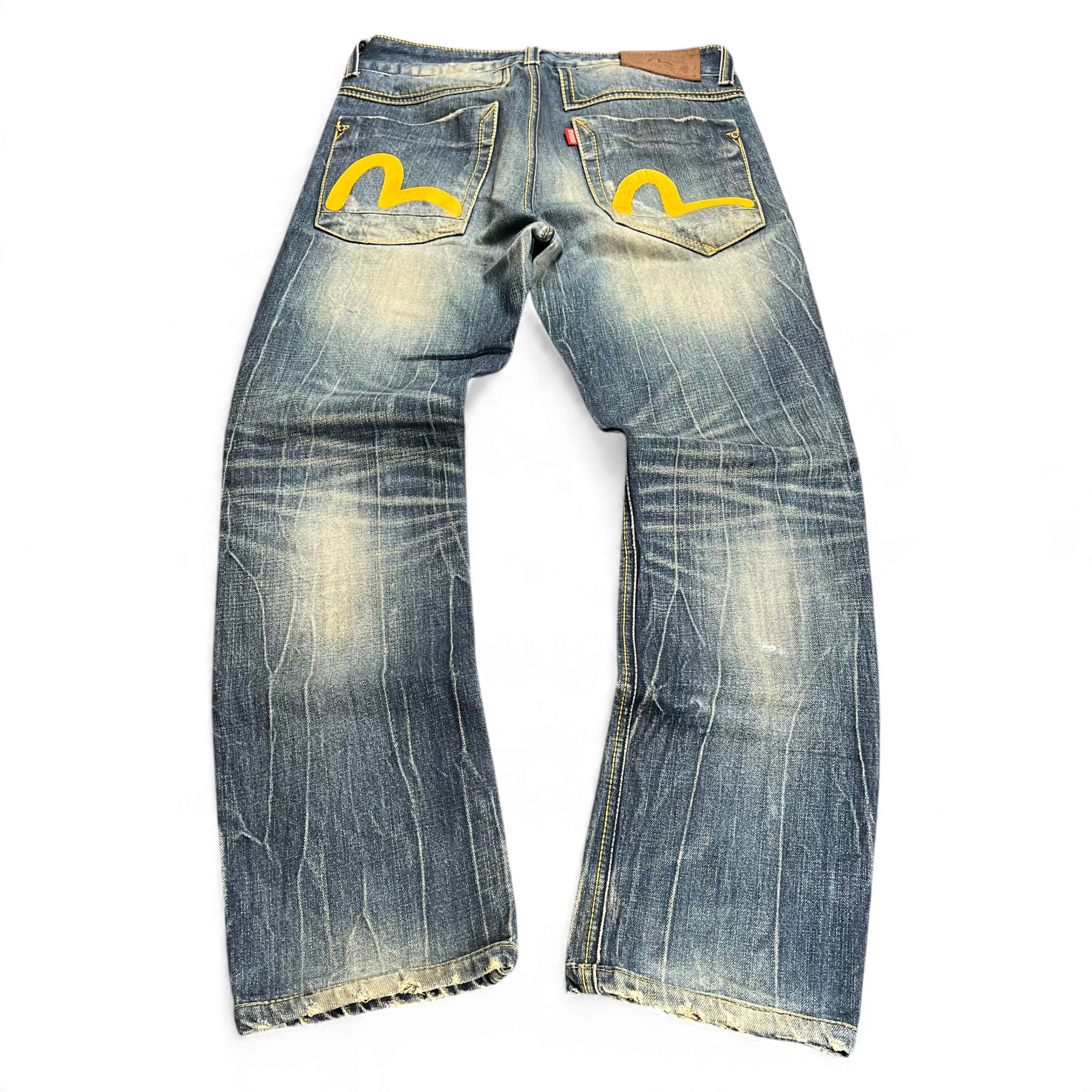 TWC Vintage Evisu KC Straight Jeans in blau mit gelben Seagull-Logos auf den Gesäßtaschen und Vintage-Waschung
