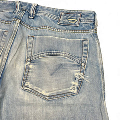 TWC Vintage Diesel Zatiny Bootcut Jeans in hellblauem Denim mit Distressed-Details und Gesäßtasche