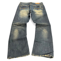 TWC Vintage Bootcut-Jeans in verwaschenem Blau mit Distressed-Details und Ziernähten auf den Gesäßtaschen