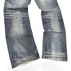 TWC Vintage Diesel Larkee Straight Jeans in verwaschenem Blau mit authentischen Tragespuren und geradem Bein.