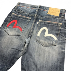 TWC Vintage Evisu Jeans mit geradem Schnitt, verwaschenem Denim und ikonischen roten und weißen Seagull-Logos.