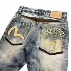 TWC Vintage Evisu Straight Jeans in verwaschenem Blau mit braunen Lederdetails und aufwendiger Stickerei auf der Tasche