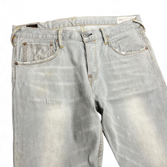 TWC Vintage Evisu Straight Jeans in verwaschenem Hellgrau mit Used-Look und klassischen Nieten-Details