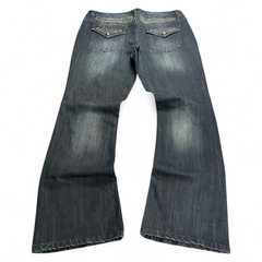 TWC Vintage Damen Y2K Bootcut Jeans in Dunkelblau mit verzierten Gesäßtaschen und verwaschener Optik