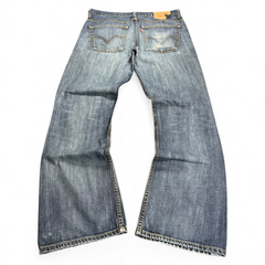 TWC Vintage Levi’s 507 Bootcut Jeans in blauem Denim mit leichter Waschung und klassischem Five-Pocket-Design