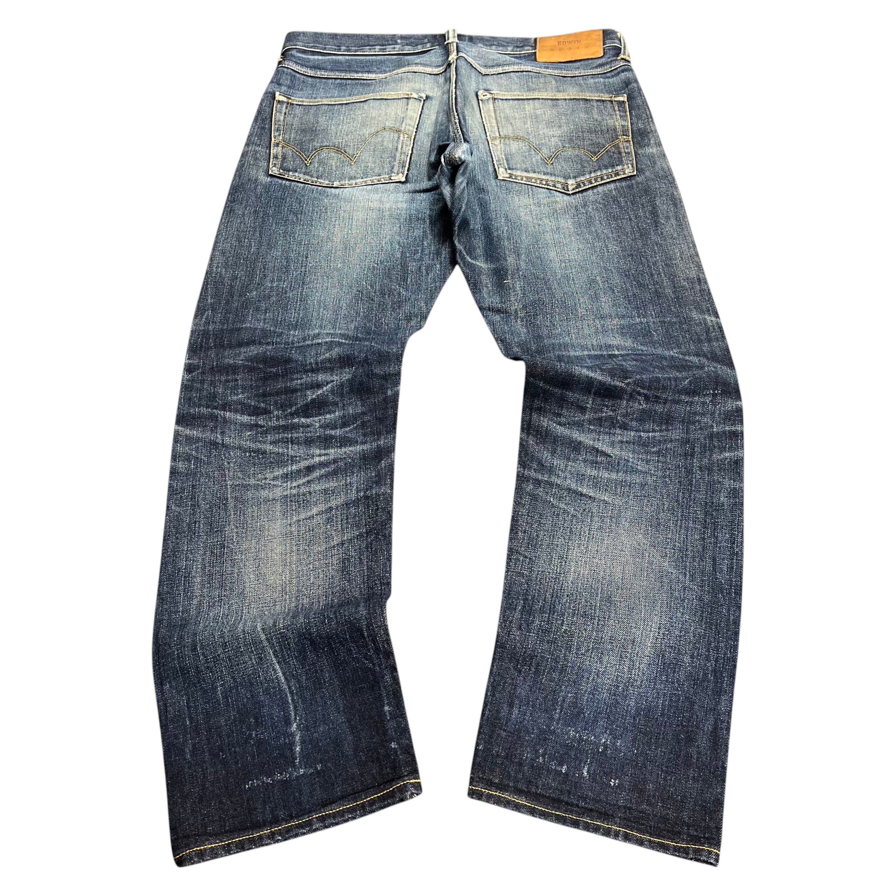 TWC Vintage Edwin Jeans aus japanischem Selvedge-Denim in verwaschenem Blau mit Leder-Patch auf der Rückseite