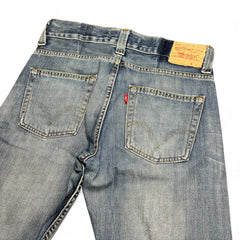 TWC Vintage Levi's 512 Bootcut Jeans in dirty wash denim with back pockets and leather patch