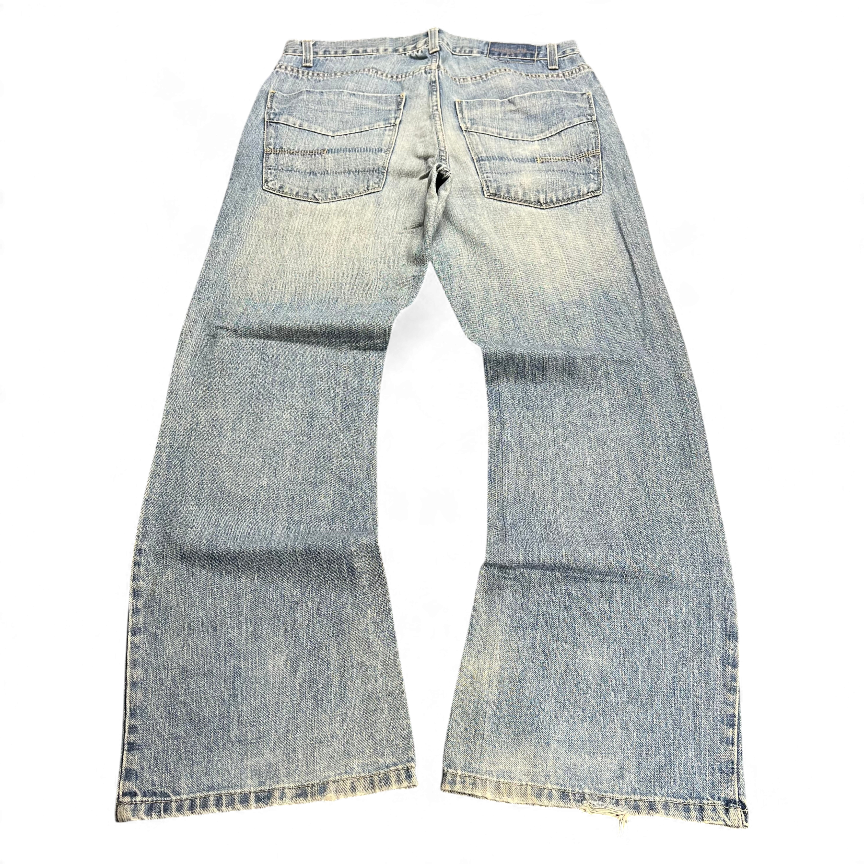 TWC Vintage Calvin Klein Bootcut Jeans aus blauem Denim im 2000er-Jahre-Stil mit markanten Gesäßtaschen