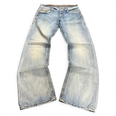TWC Vintage Rock Revival Bootcut Jeans in hellblauem Denim mit aufwendigen Stickereien und Used-Look