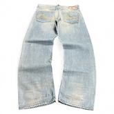TWC Vintage Evisu Jeans in hellblauem Denim mit Distressed-Optik und charakteristischem Seagull-Print auf den Taschen