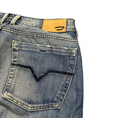 TWC Vintage Diesel Zathan Bootcut Jeans in blauem Denim mit charakteristischer Gesäßtaschen-Stickerei und Leder-Patch