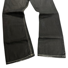 TWC Vintage Evisu x Puma Bootcut Jeans in Schwarz mit Kontrastnähten und leichtem Used-Look am Saum