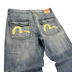 TWC Vintage Evisu Baggy Jeans in verwaschenem Blau mit gelbem Seagull-Logo auf den Gesäßtaschen
