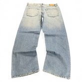 TWC Vintage Dolce&Gabbana Baggy Jeans in hellblauem Denim mit weitem Bein und Leder-Label auf der Rückseite
