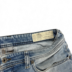 TWC Vintage Diesel Larkee Straight Jeans mit authentischem Markenlabel und Knopfdetail in verwaschenem Blau