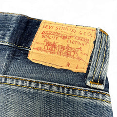 TWC Vintage Levi’s 512 Bootcut Jeans in Dirty Wash mit klassischem Leder-Patch und gelben Kontrastnähten
