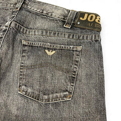 TWC Vintage Armani Jeans in verwaschenem Schwarz mit Logo-Stickerei auf der Gesäßtasche und Leder-Patch am Bund