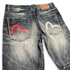 TWC Vintage Evisu KC Baggy Jeans mit verwaschener Optik, roten und weißen Seagull-Logos auf den Gesäßtaschen