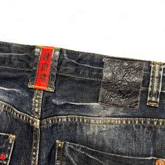 TWC Vintage japanische Jeans mit rotem Stickerei-Label und schwarzem Lederpatch am Bund