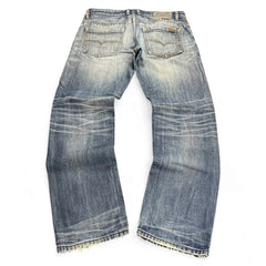 TWC Vintage Diesel Straight Jeans in verwaschenem Blau mit Used-Look und geradem Bein, Rückansicht