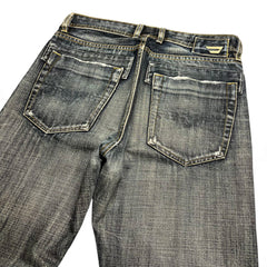 TWC Vintage Diesel Slim Jeans in verwaschenem Blau mit Distressed-Details und Gesäßtaschen