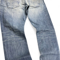 TWC Vintage Diesel Straight Jeans in verwaschenem Blau mit markanten Fading-Details und Gesäßtaschen