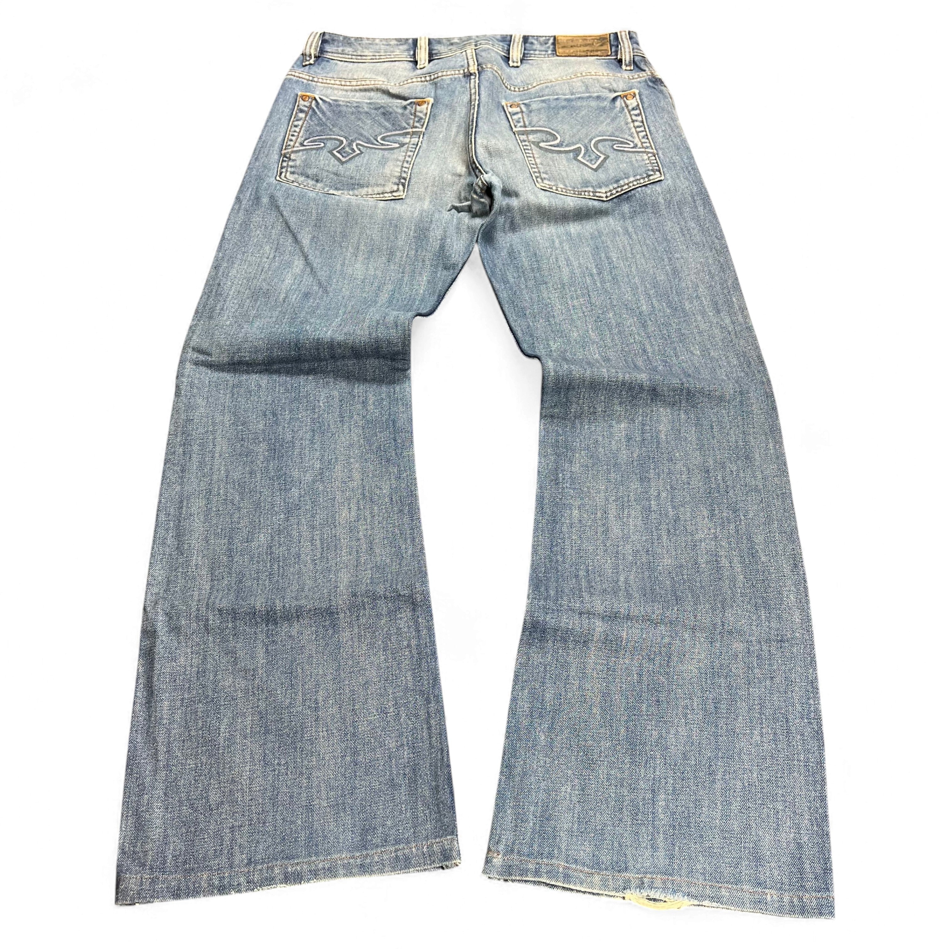 TWC Vintage Diesel Zaghor Bootcut Jeans in blau mit charakteristischen Stickereien auf den Gesäßtaschen