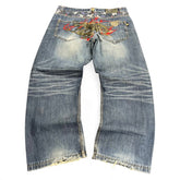TWC Vintage Jeans aus japanischem Selvedge-Denim mit auffälliger Drachenstickerei auf der Rückseite