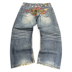 TWC Vintage Jeans aus japanischem Selvedge-Denim mit auffälliger Drachenstickerei auf der Rückseite