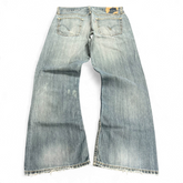 TWC Vintage Levi’s 527 Bootcut Jeans in hellblauem Denim mit Used-Optik und ausgefransten Säumen, Rückansicht