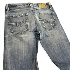 TWC Vintage Diesel Larkee Straight Jeans in verwaschenem Blau mit markanten Gesäßtaschen und Leder-Label