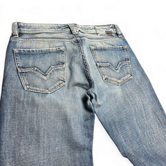 TWC Vintage Diesel Larkee Straight Jeans in verwaschenem Blau mit markanten Gesäßtaschen und geradem Schnitt