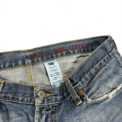 TWC Vintage Levi's 527 Bootcut Jeans aus blauem Denim mit Limited Edition Stickerei am Innenbund