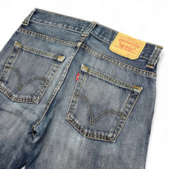 TWC Vintage Levi's 512 Jeans in verwaschenem Blau mit klassischem Lederpatch und Gesäßtaschen