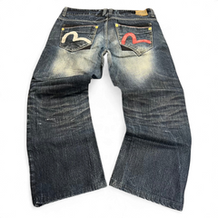TWC Vintage Evisu KC Straight Jeans in dunkelblauem Denim mit ikonischen bemalten Gesäßtaschen und geradem Schnitt