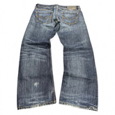 TWC Vintage Diesel Larkee Straight Jeans in blau mit Used-Look und markanten Gesäßtaschen, Rückansicht