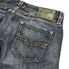 TWC Vintage Diesel Larkee Straight Jeans in dunkelblauem Denim mit markantem Leder-Patch und Gesäßtaschen-Details