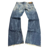 TWC Vintage Diesel Zatiny Bootcut Jeans in verwaschenem Blau mit ausgefransten Säumen und Leder-Patch auf der Rückseite