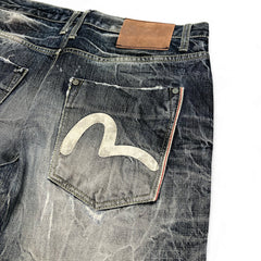 TWC Vintage Evisu KC Baggy Jeans in verwaschenem Denim mit ikonischem weißem Seagull-Logo auf der Gesäßtasche