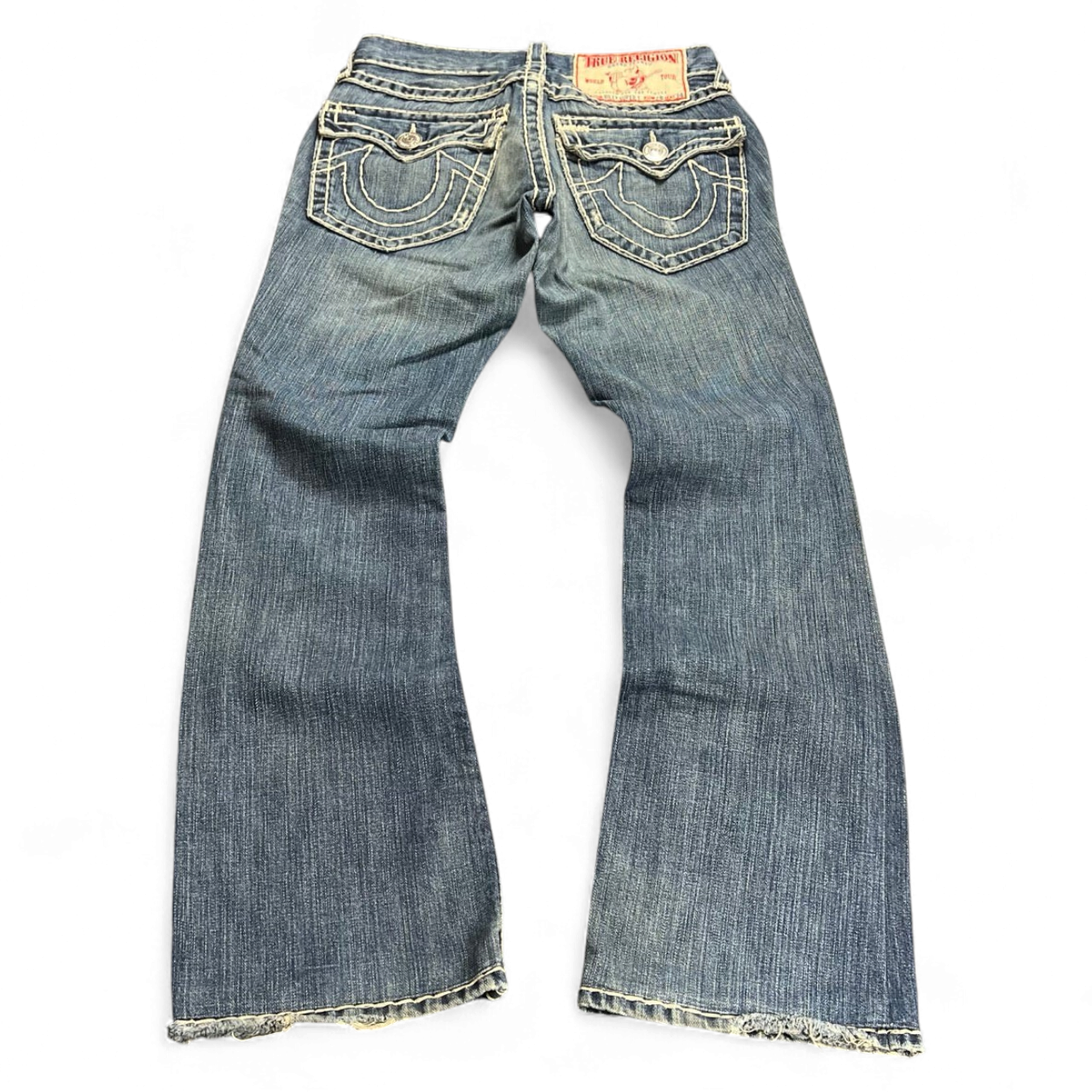 TWC Vintage True Religion Billy Super T Bootcut Jeans in blauem Denim mit markanten Kontrastnähten und ausgefranstem Saum