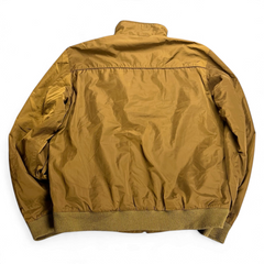 TWC Vintage Lacoste Jacke in Senfgelb mit Stehkragen und geripptem Saum, Rückansicht