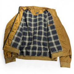 TWC Vintage Lacoste Jacke in Braun mit kariertem Innenfutter und gerippten Bündchen im Vintage-Stil