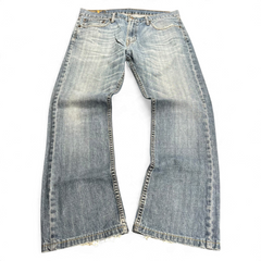 TWC Vintage Levi's 527 Bootcut Jeans in hellblauem Denim mit Used-Look und ausgefransten Beinabschlüssen