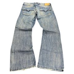 TWC Vintage Diesel Zathan Bootcut Jeans in blauem Denim mit charakteristischen Gesäßtaschen-Nähten, Rückansicht
