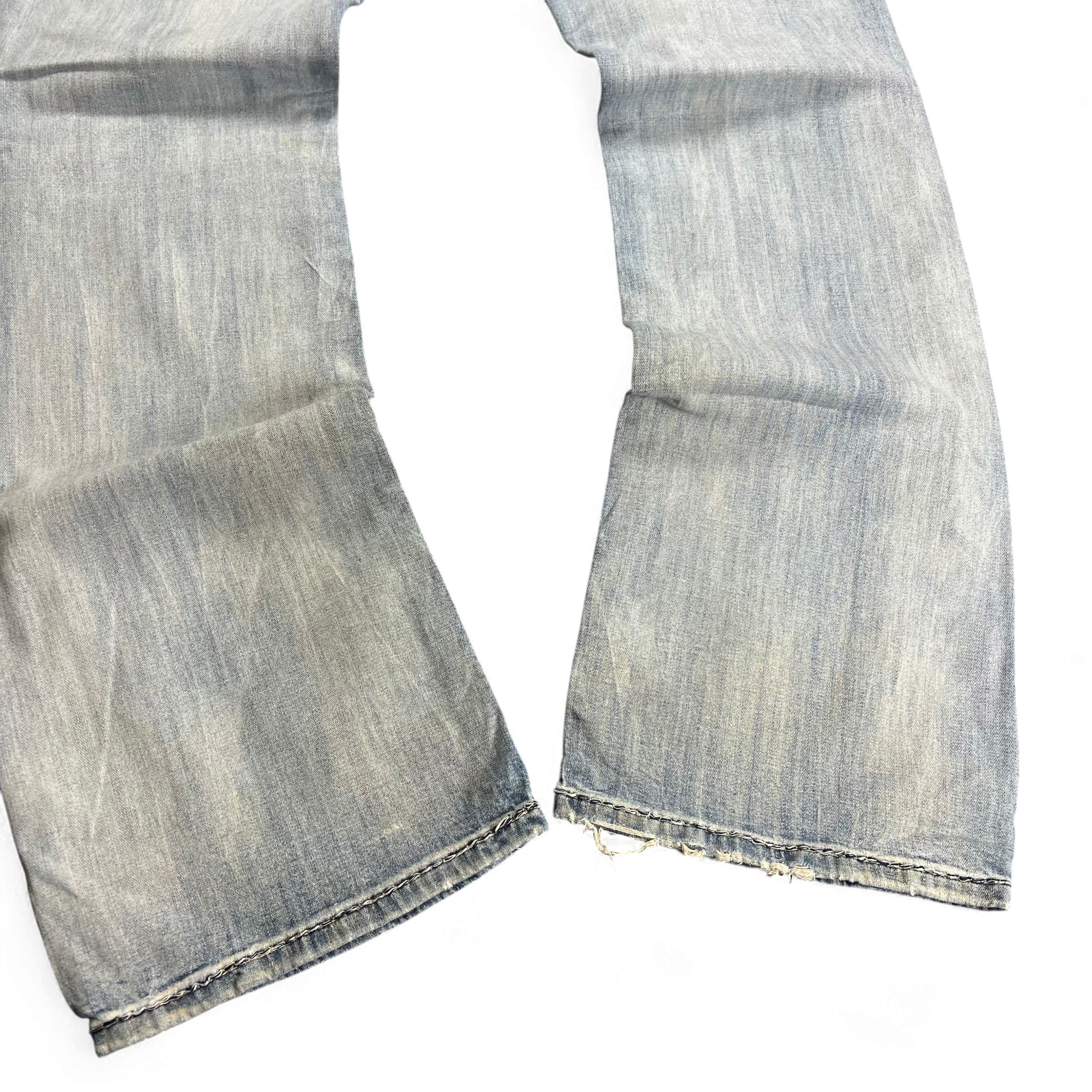 TWC Vintage Rock Revival Bootcut Jeans in hellblauem Denim mit ausgefransten Beinabschlüssen