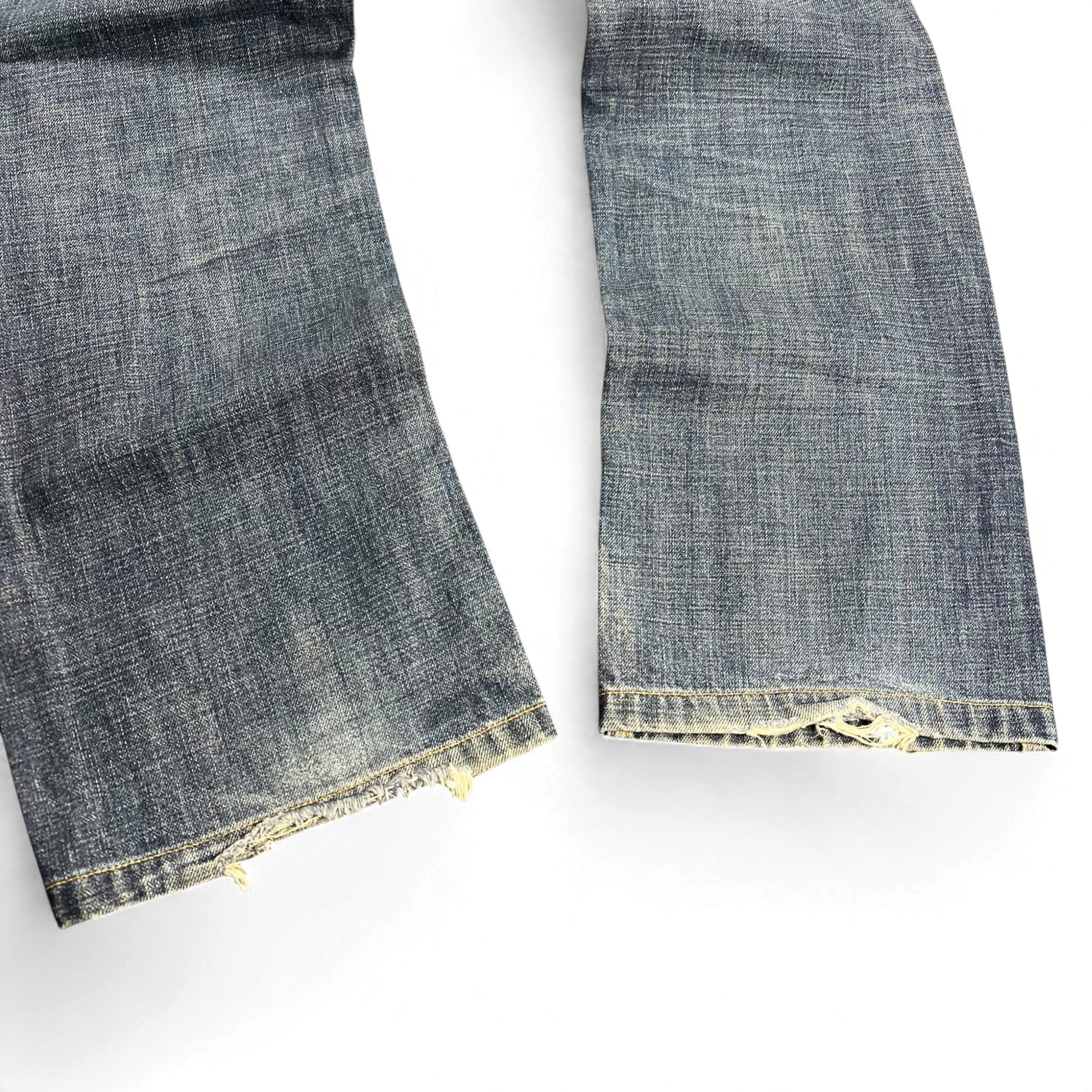 TWC Vintage Diesel Larkee Jeans mit geradem Bein in verwaschenem Blau mit abgenutzten Saumdetails