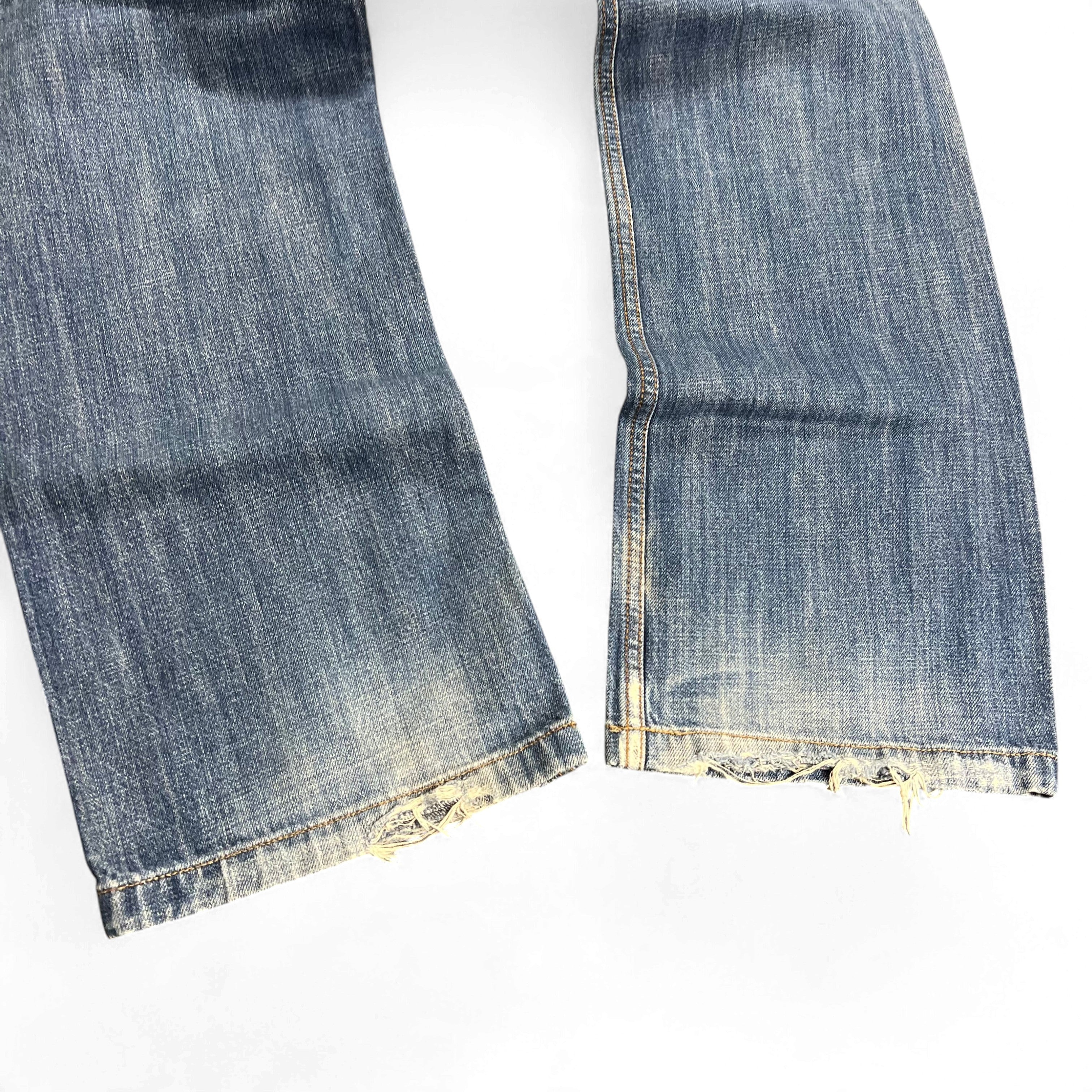 TWC Vintage Diesel Busky Straight Jeans mit verwaschener blauer Waschung und ausgefransten Beinabschlüssen